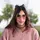 Person with sunglasses and cat ears headband