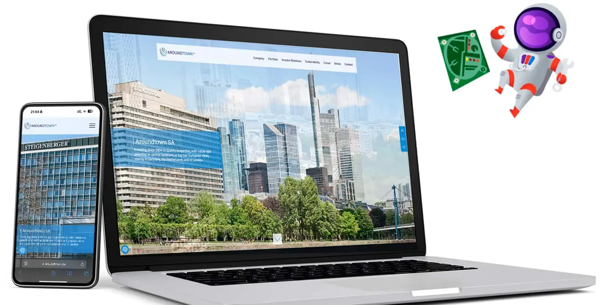 Laptop and mobile phone displaying cityscape website with floating robot